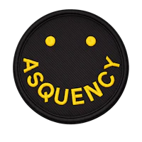 a black patch with a yellow smiley face on it